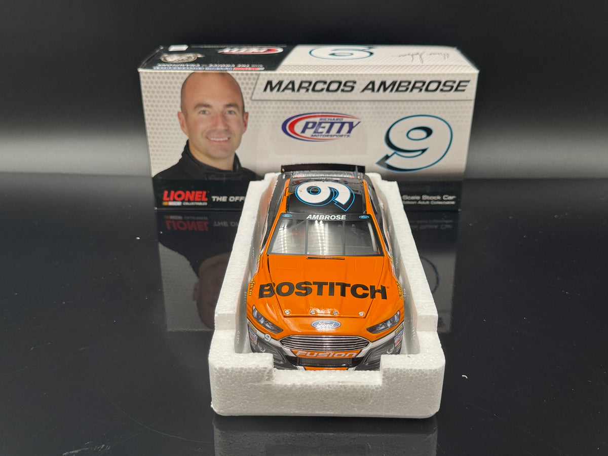 Marcos Ambrose #9 Bostitch 2013 Fusion