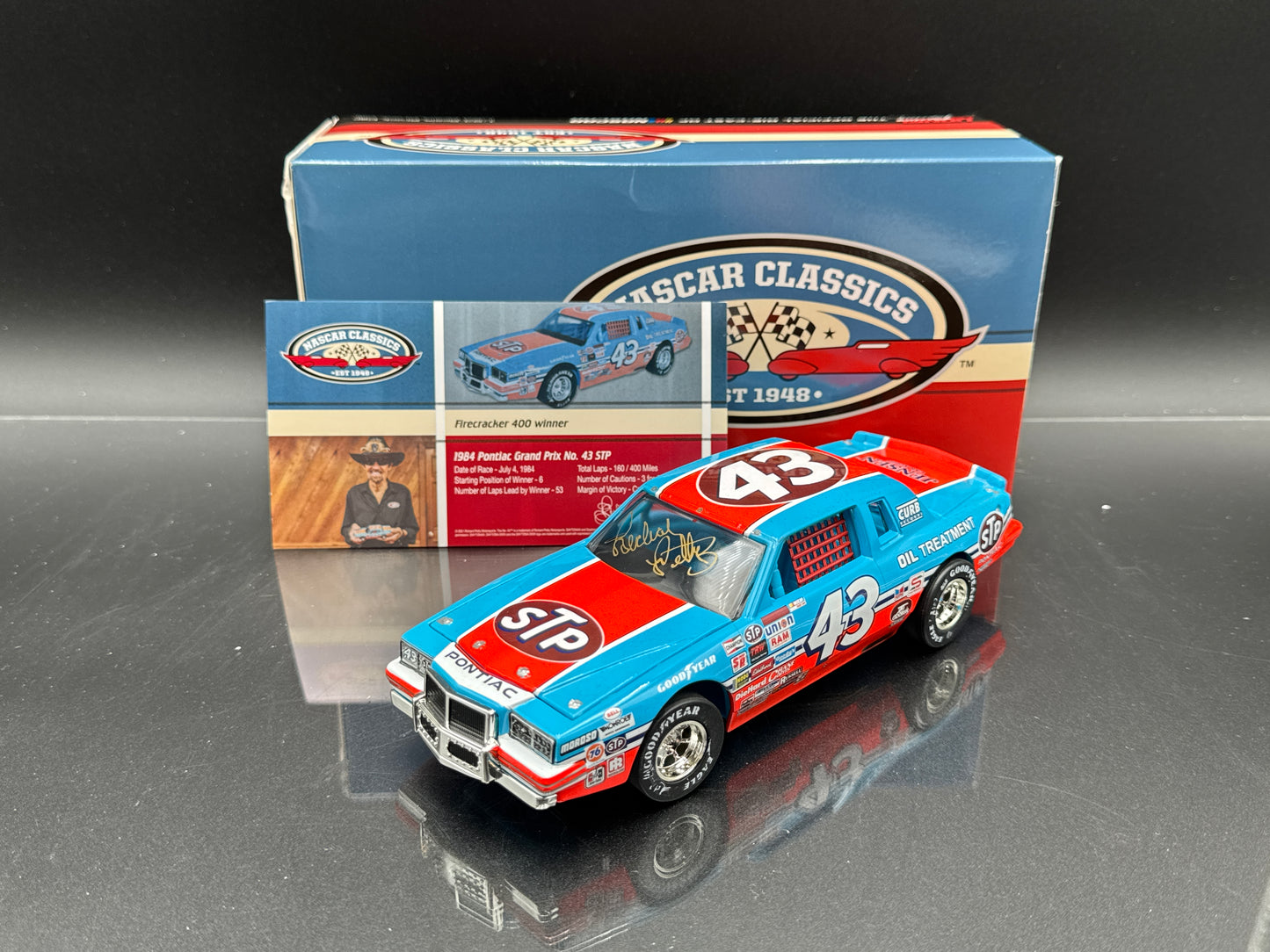 RICHARD PETTY #43 STP Firecracker 400 200th Win 1984 Pontiac