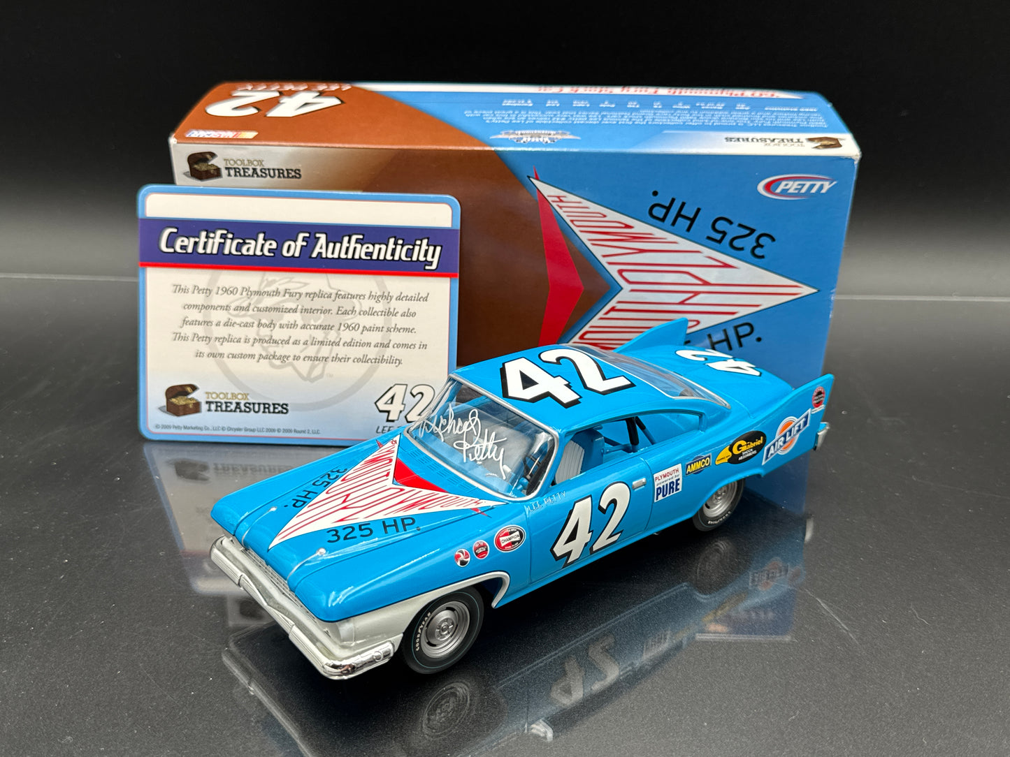 Richard Petty #42 1960 Plymouth Fury Autographed